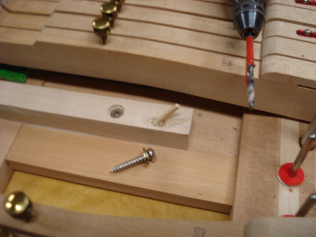 3 - Drill & glue shim in 2 stripped screw holes